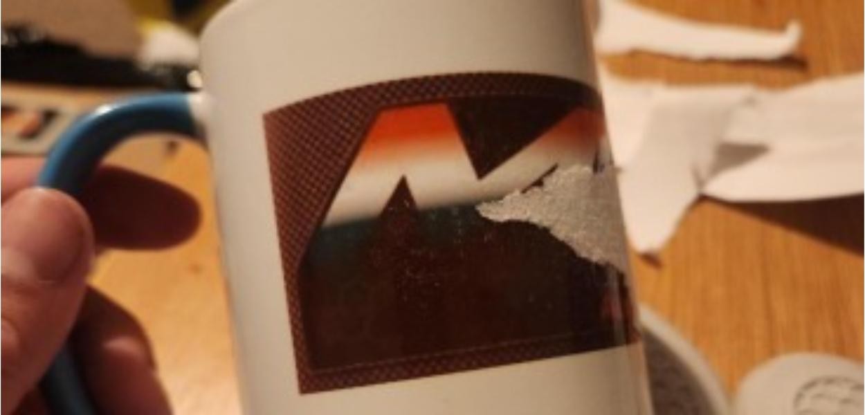 What causes paper to stick to sublimation tumblers?
